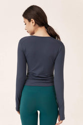 Langärmliges Sporttop mit halbem Reißverschluss und Kordelzug